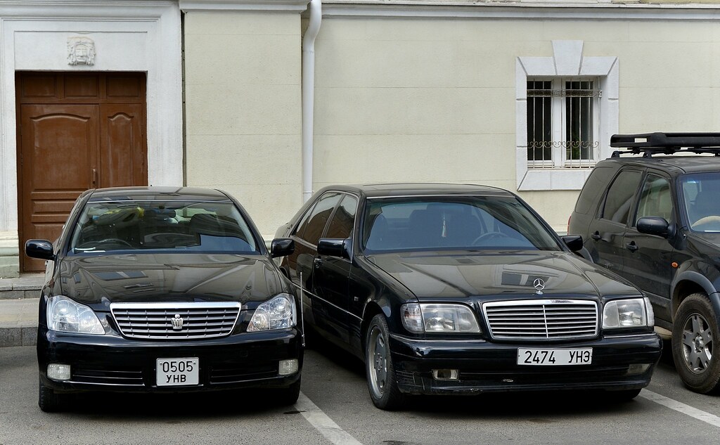 Soft-Luxury Compare and Contrast: Toyota Crown vs. Mercedes-C200 (Older Imports) in the role of the Executive cars on a used budget.